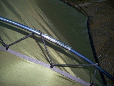 Using a length of tube as a bridging piece to fix a snapped tent pole on my Vaude tent.