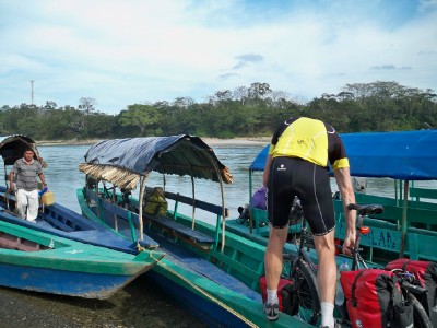 Loading the bicycles onto lanchas for the river crossing