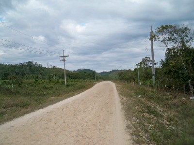 Cycling along a rough little road in Guatemala