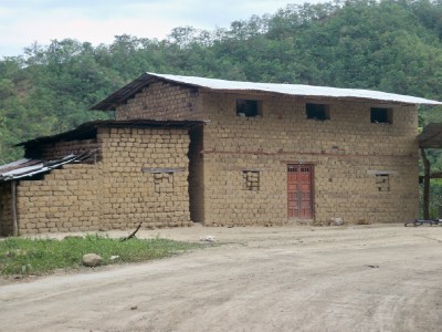 A mud brick house in Peru near the border with Ecuador