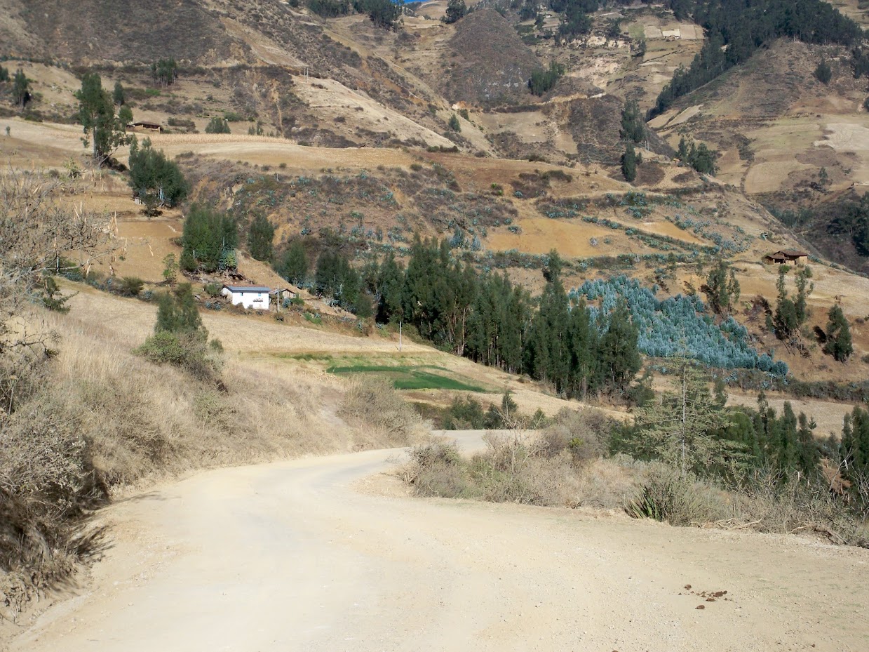 Cycling out of Santiago de Chuco in Peru on yet another sandy road.