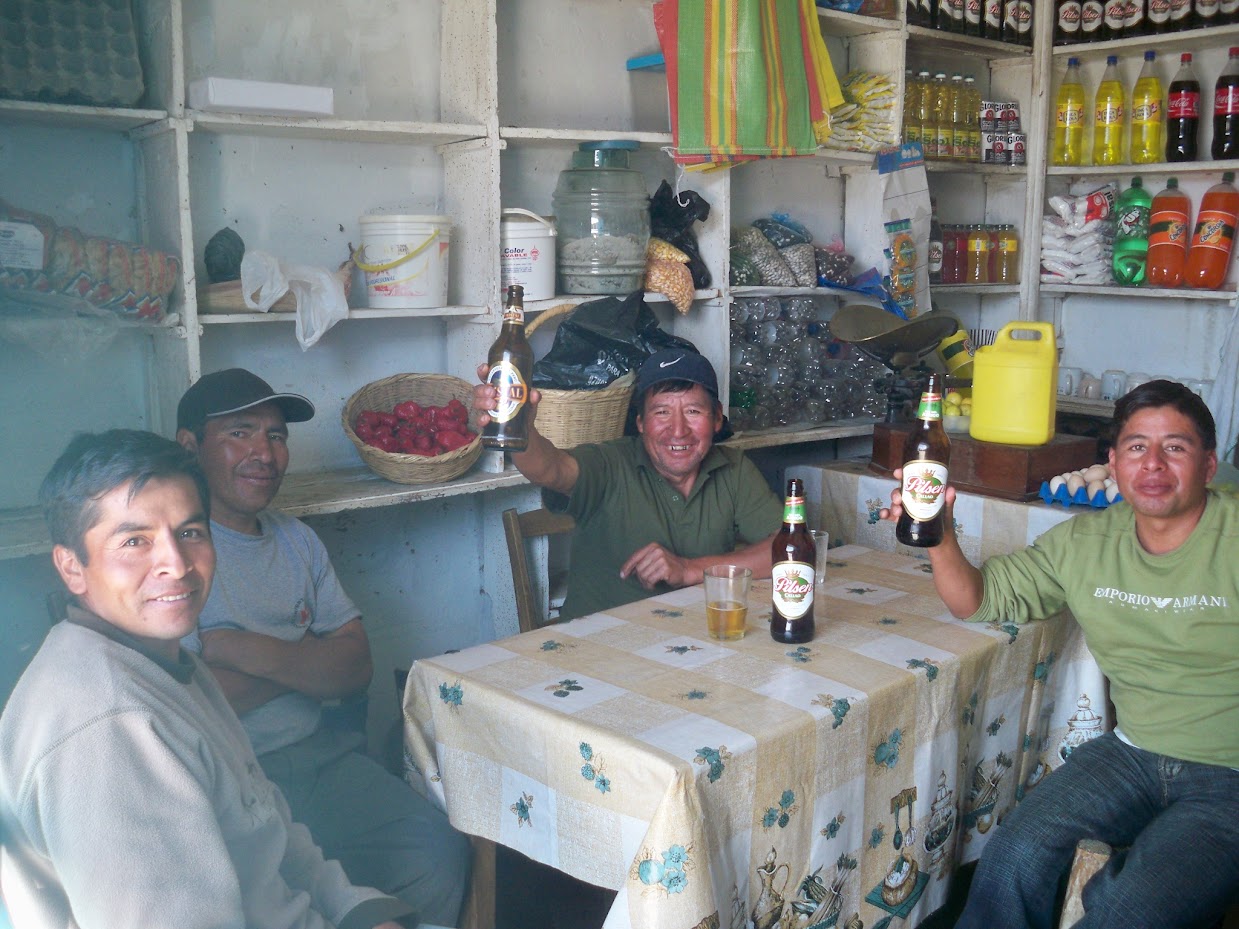 Having a drink with the locals in Pallasca Peru