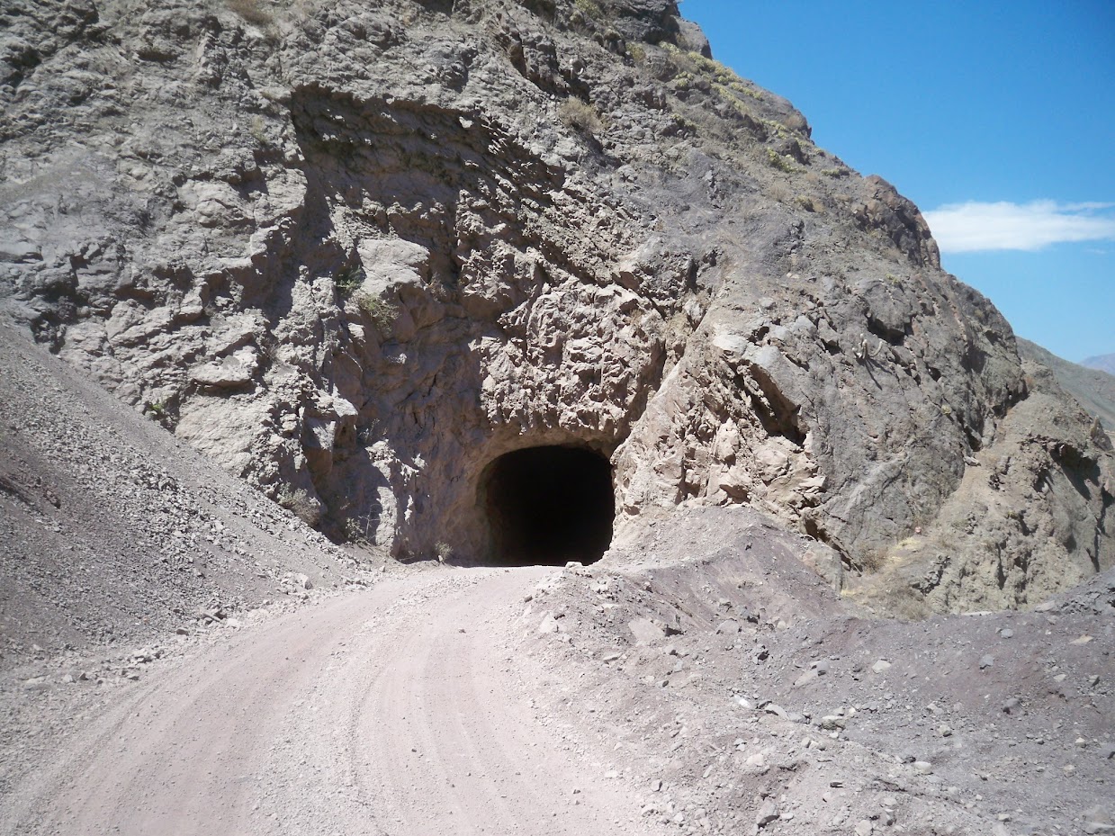 Passing through tunnels when Cycling near Chuqicara in Peru