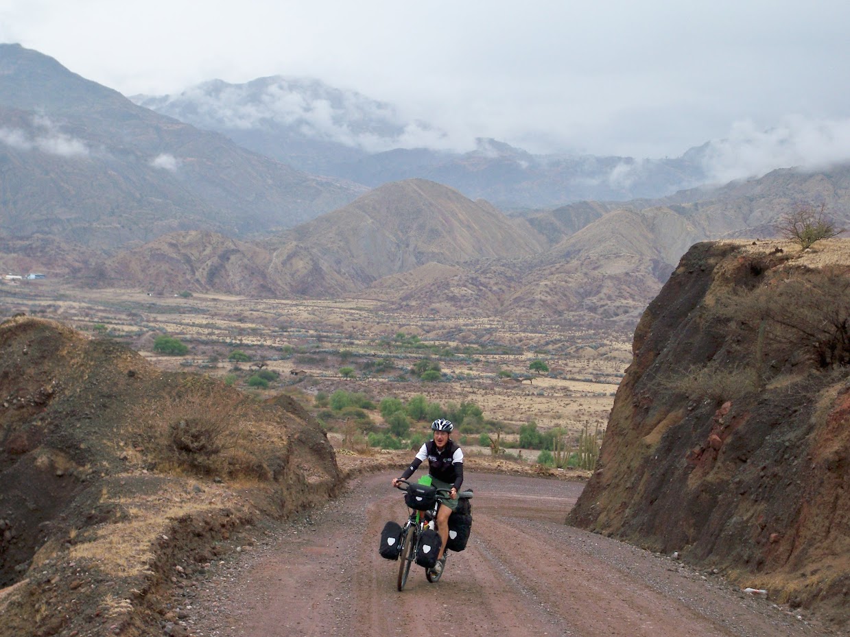 Agusti struggling to cycle uphill in Peru