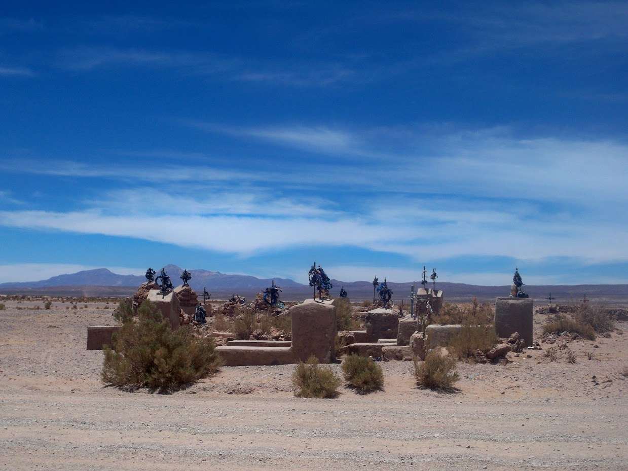 A cemetary in the middle of the desert in Bolivia