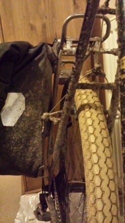 You can get some idea of where the brakes stick out, with the pannier behind