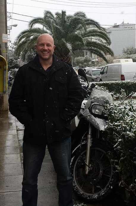 Dave Briggs enjoying snow in Athens Greece