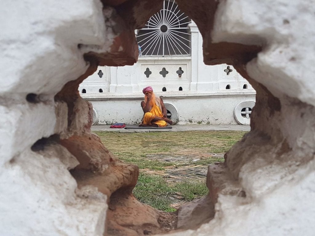 A travel photo of a yogi in Kathmandu