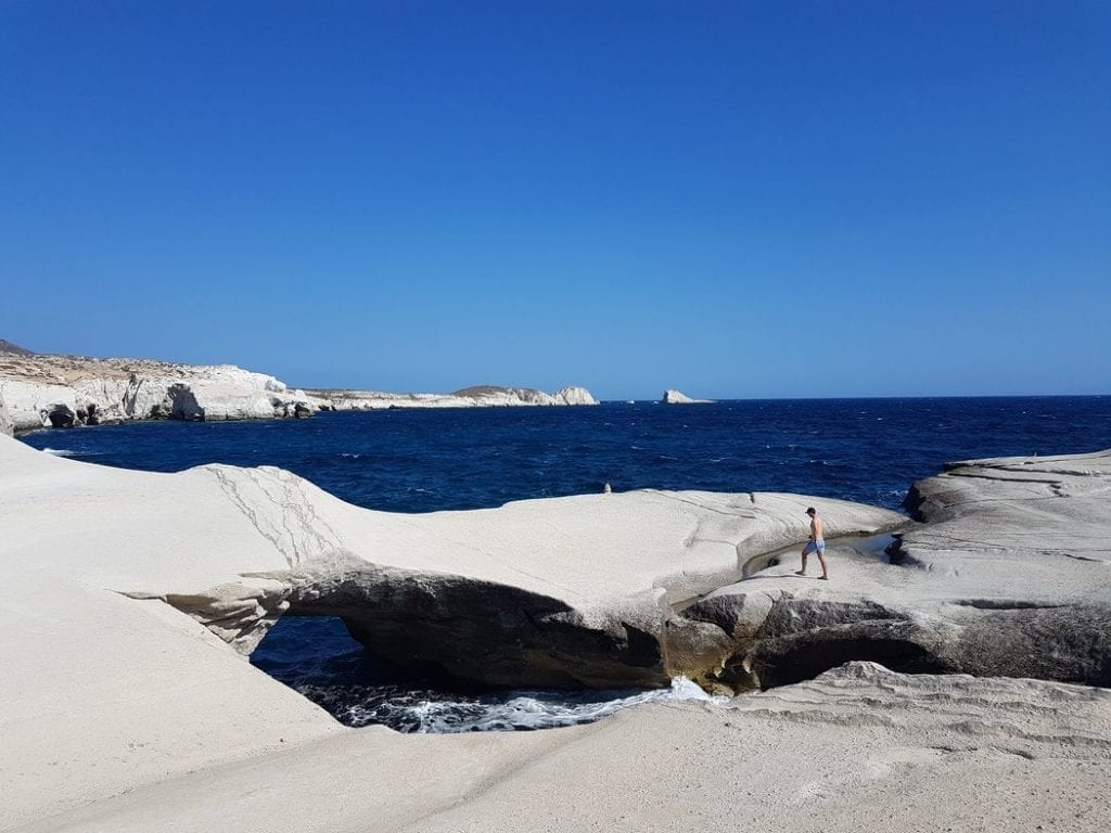 Sarakiniko beach on Milos is often described as one of the most beautiful beaches in Greece. Is it the best beach in Milos to spend your time on though? This guide will help your draw your own conclusions.