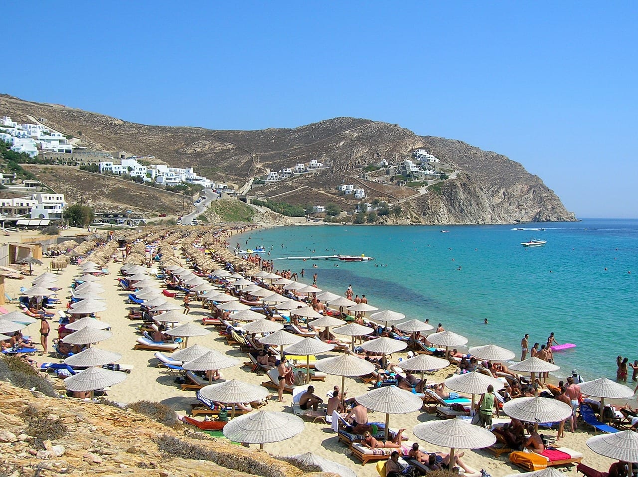 The best beaches in Mykonos are organised with umbrellas for shade