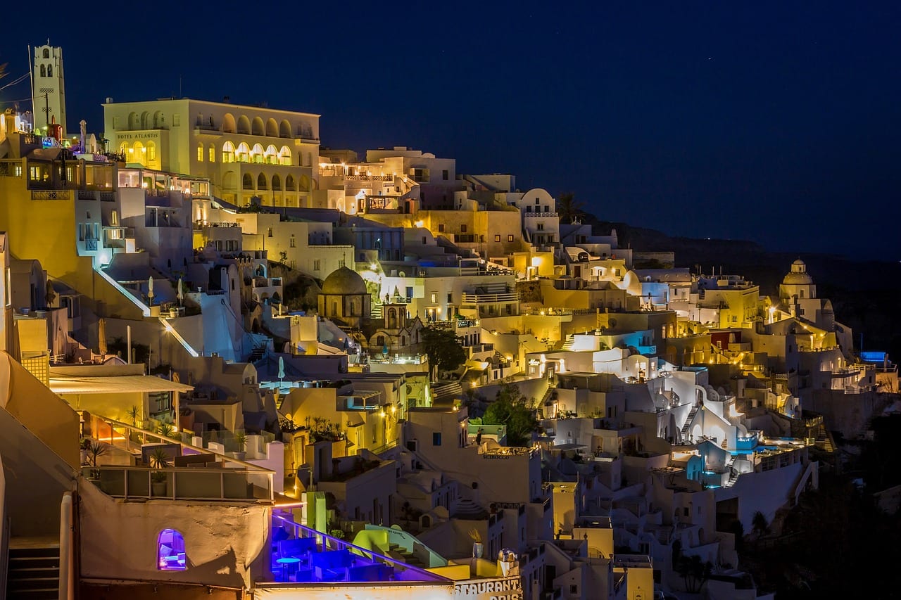 An view out over Santorini during the evening. Santorini is a must visit when planning a Greek island itinerary.