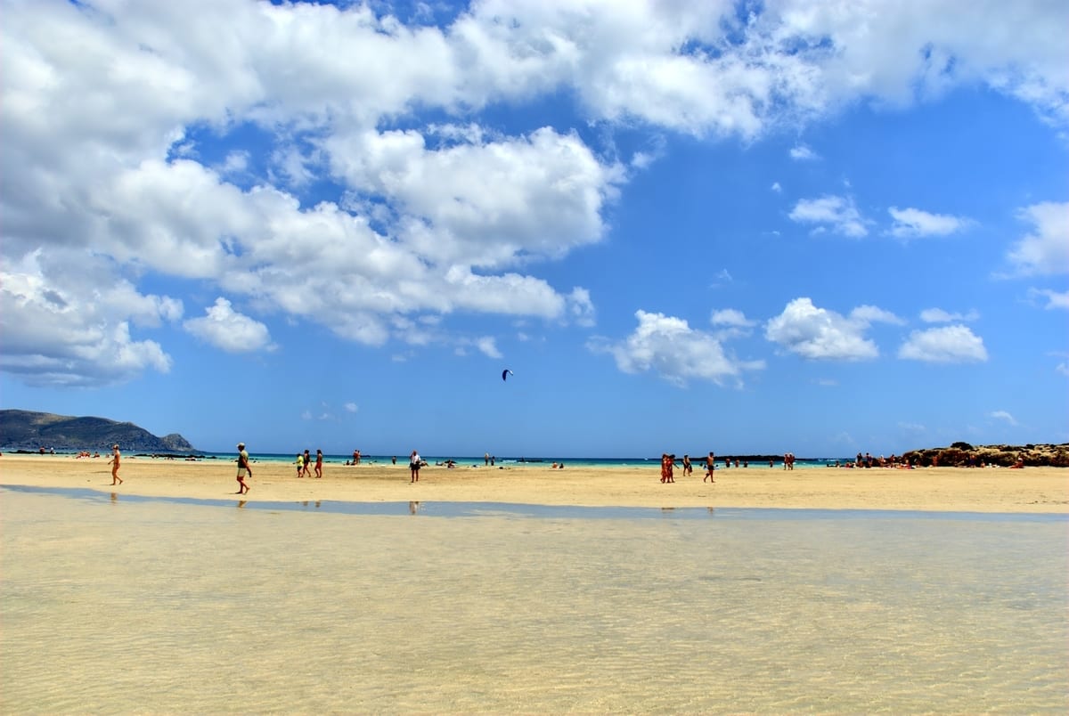 european cities to visit october Enjoying time on Elafonisi beach in Crete