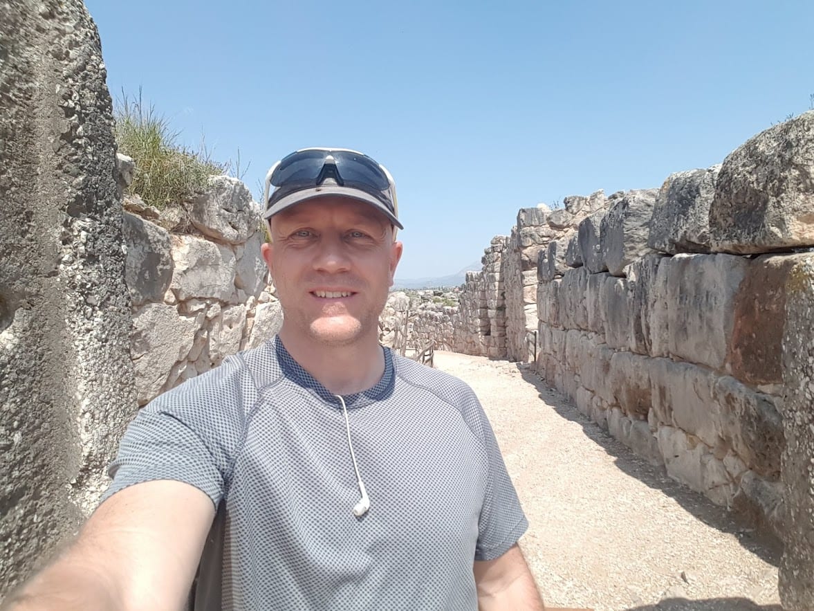 Dave Briggs walking along the walls of Tiryns