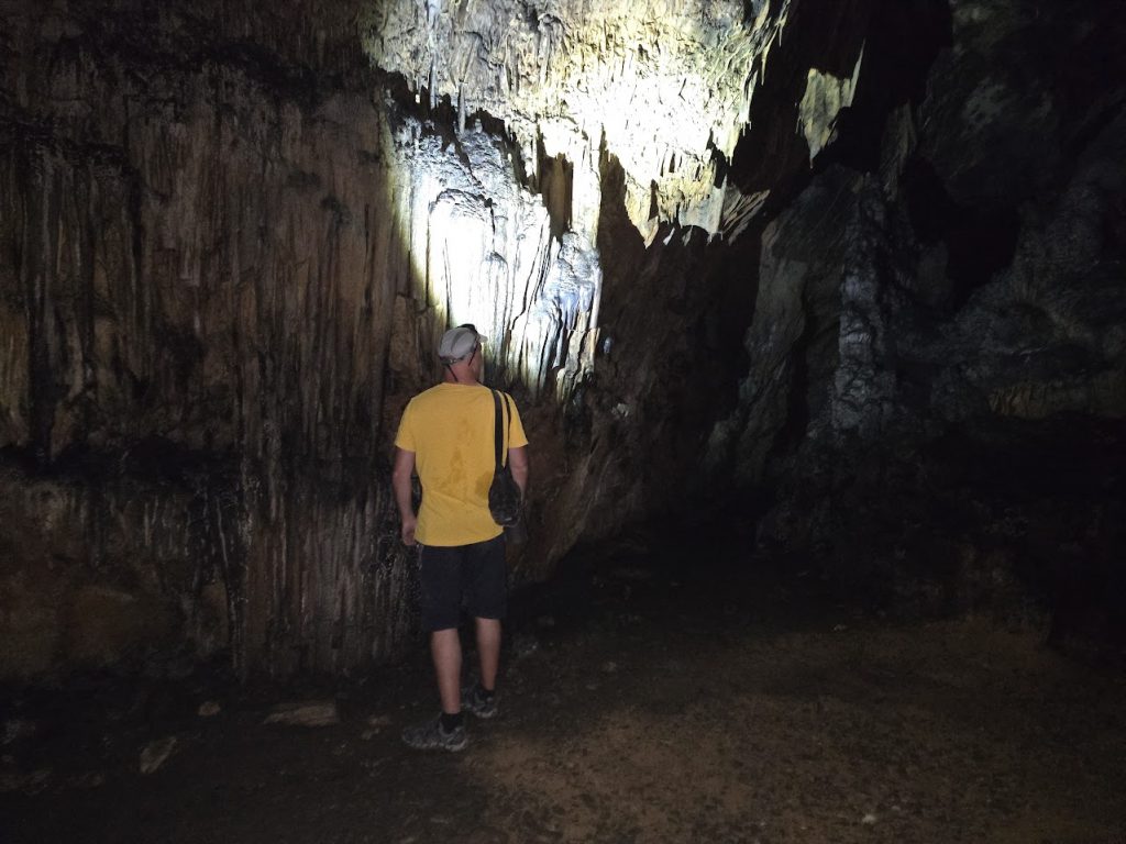 Dave Briggs travel blogger inside cave of st john in iraklia, greece