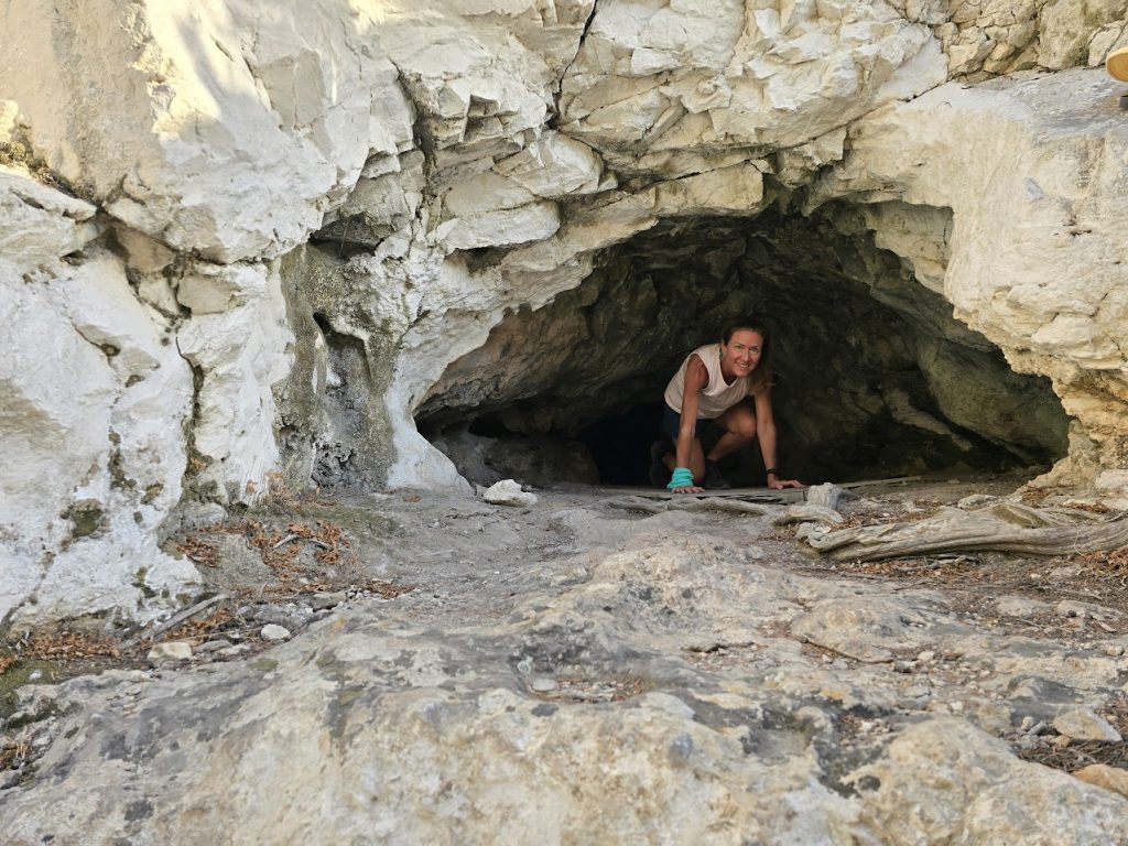 Entering the cave of st john in iraklia