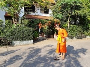 Buddhist monk on mobile phone