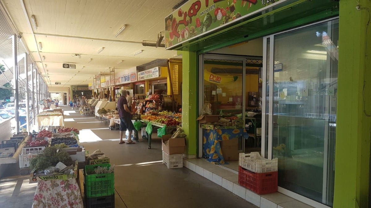 Buying olives at the Kalamata food market