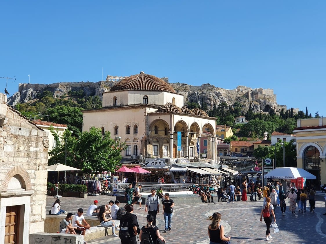 A look at Monastiraki Square in Athens Greece - Acropolis in background