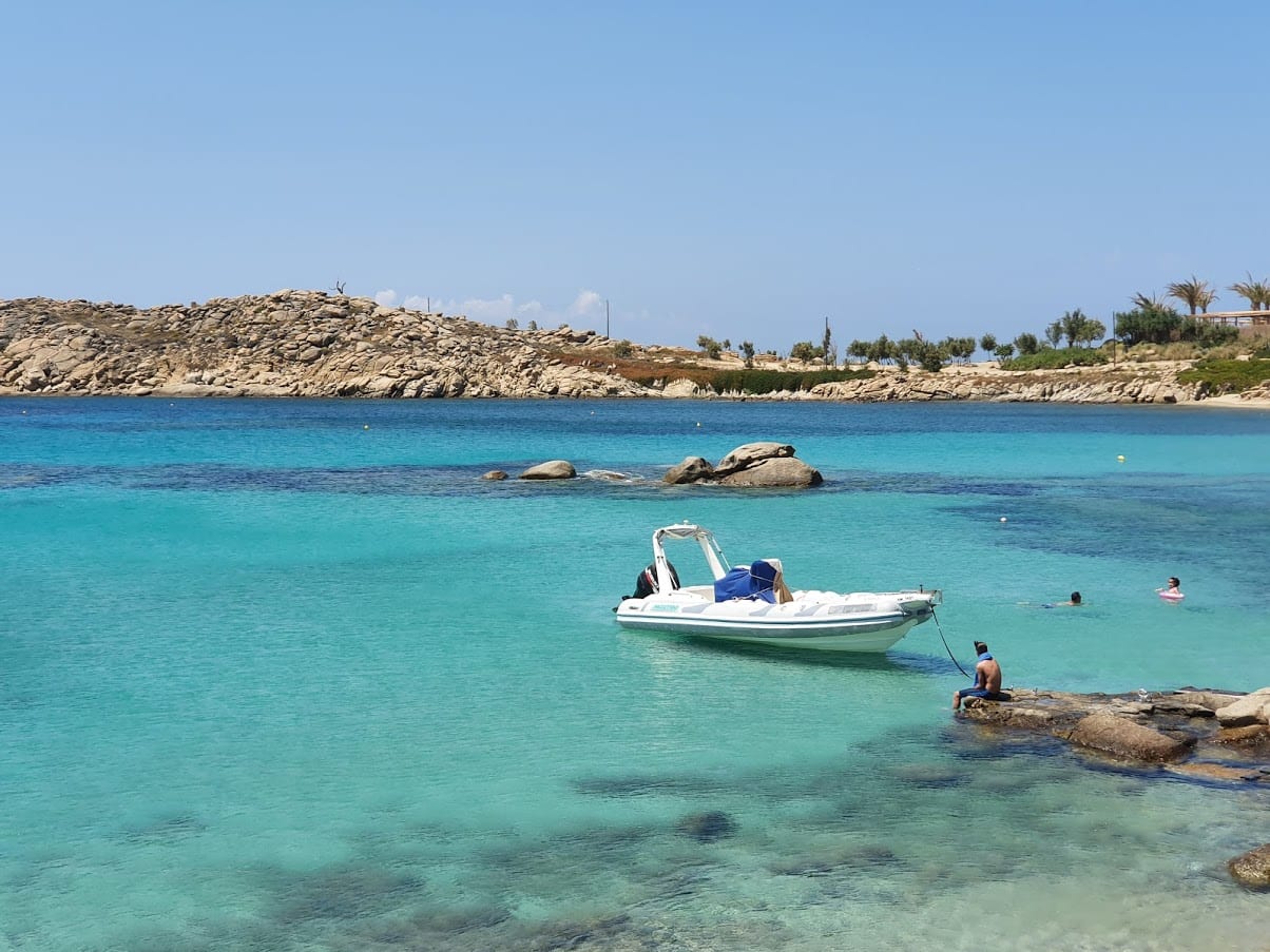 Reasons to visit Mykonos include amazing coloured seas like this one