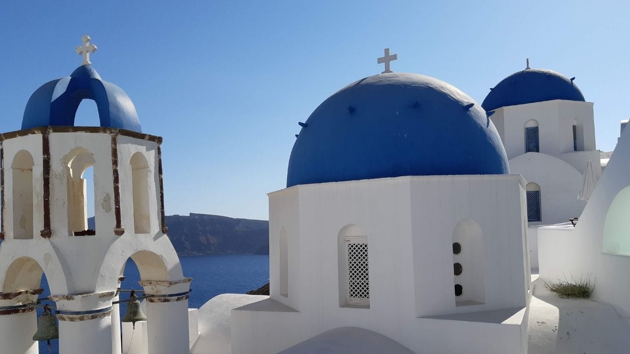 The blue and white buildings in Santorini are popular landmarks in Greece