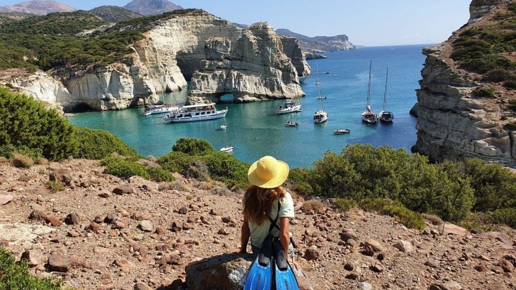 Yachts arriving in Kleftiko Bay in Milos Island Greece