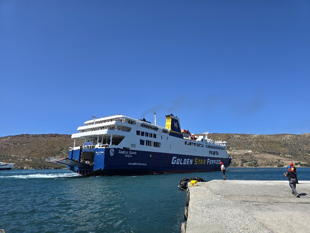 ferry arriving at gavrio port in andros, greece