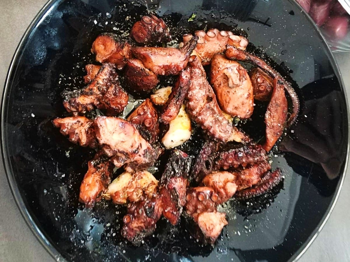 Eating grilled Octopus in Greece - one of the local dishes