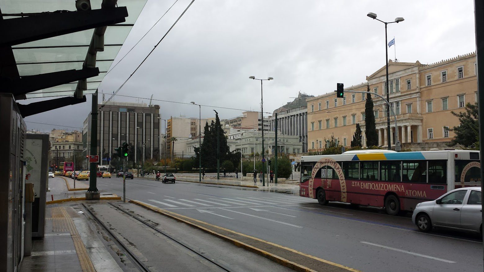 A local city bus in Athens passing the parliament