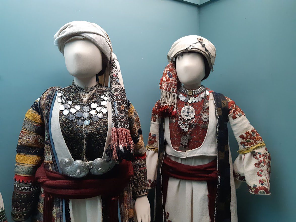 Traditional local costumes on display inside the folklore museum in Nafplio, Greece