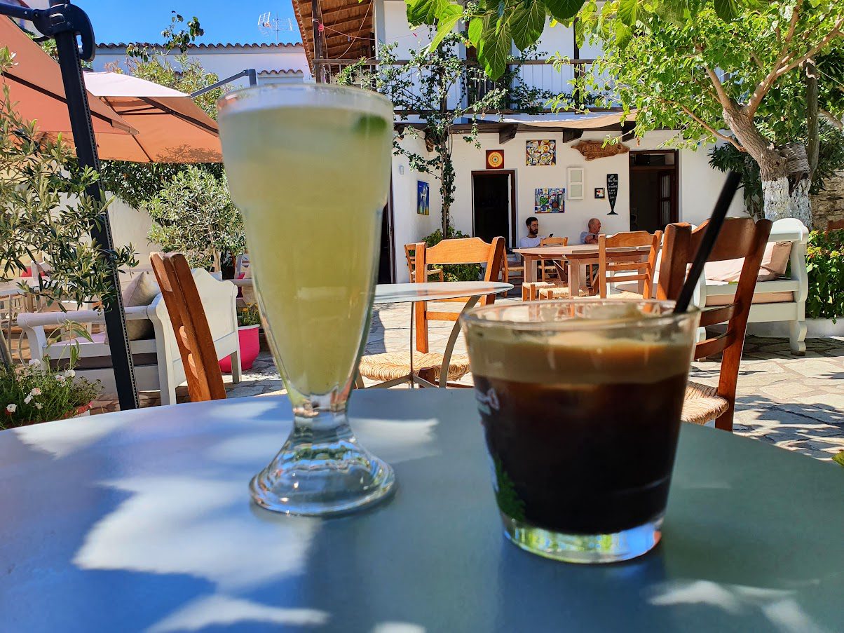 Enjoying cold drinks after hiking from Patitiri to Chora in Alonissos, Greece