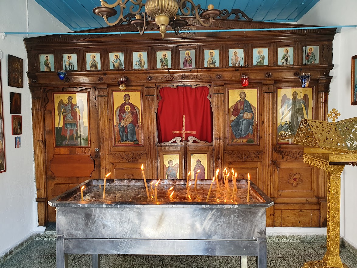 Candles inside Agios Ioannis Kastri in Skopelos