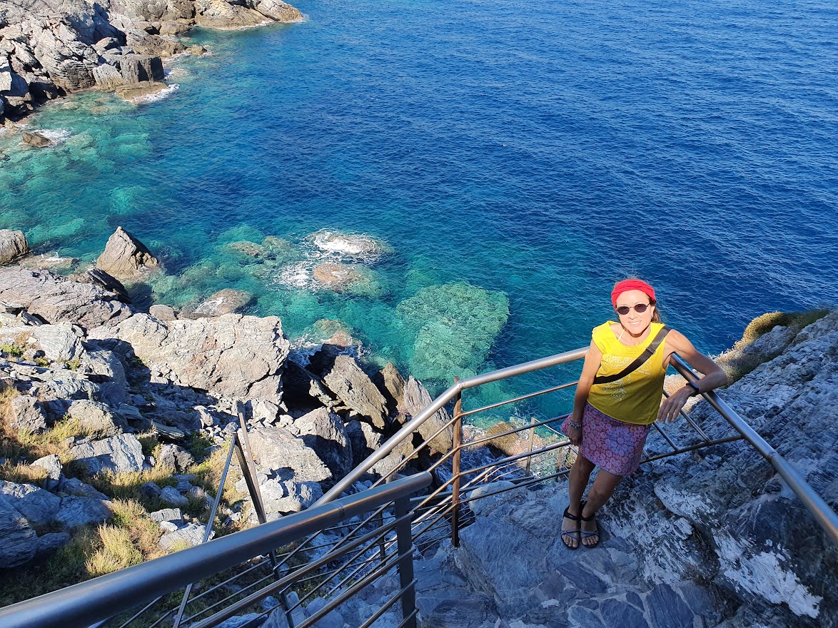 Climbing the stone steps up to Agios Ioannis Kastri in Skopelos