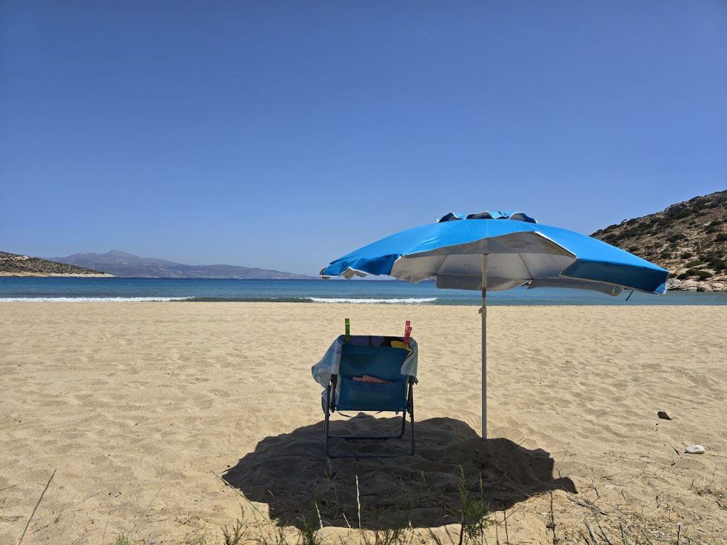 Taking some shade in Livadi Beach in Iraklia, Greece